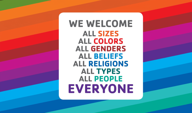 1. A vibrant rainbow poster displaying the welcoming message 