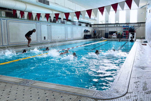 a group of people in a swimming pool