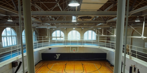 a basketball court inside of a large building