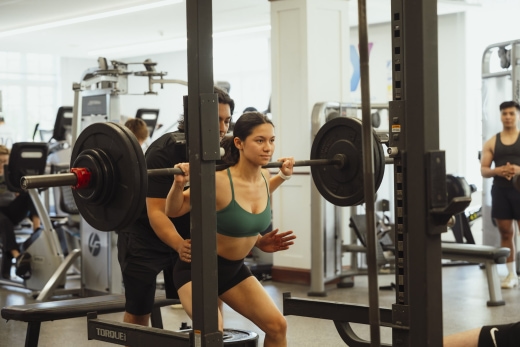 a group of people working out in a gym