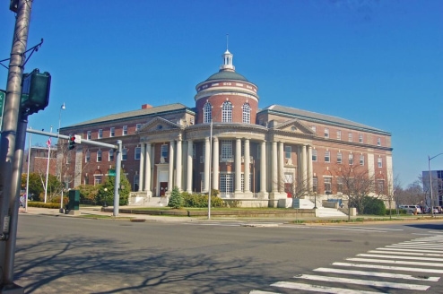 a large brick building with columns