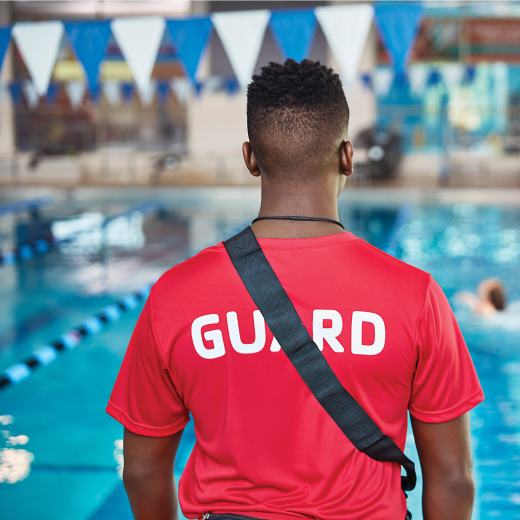 lifeguard In front of pool