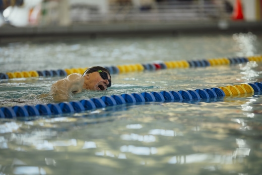 a person swimming with goggles